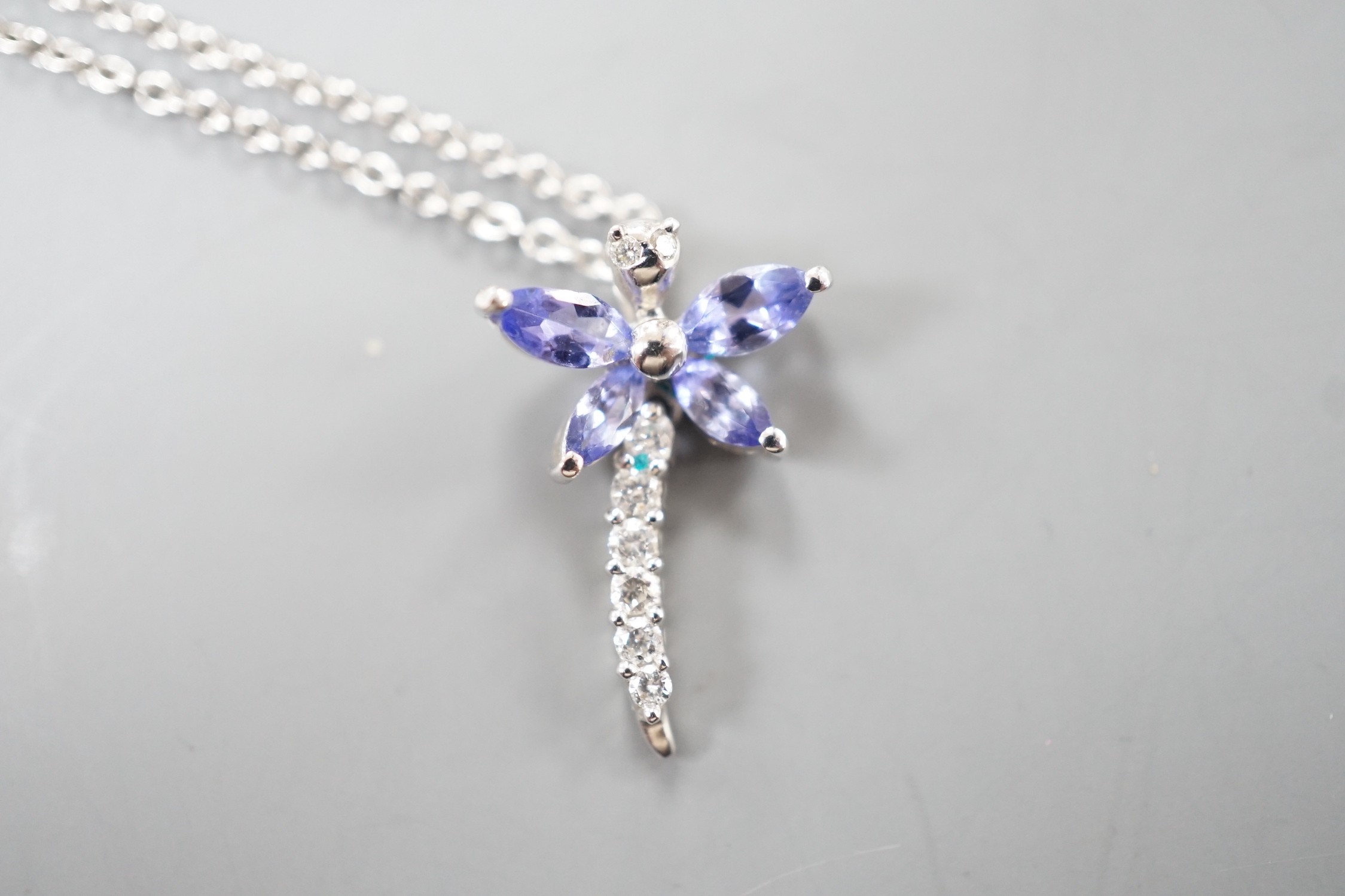 A modern Italian 18ct white gold, tanzanite? and diamond set dragonfly pendant necklace, pendant, 18mm, chain 43cm, gross weight 3.3 grams.